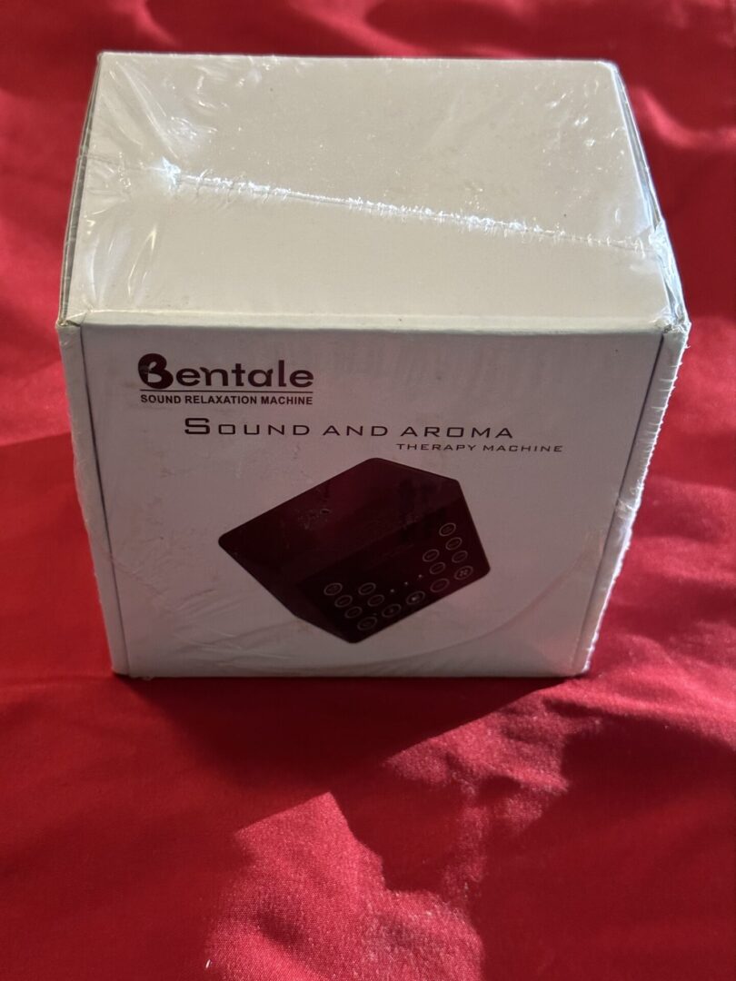 A box with the Bentale Sound and Aroma Therapy Machine on top of it.