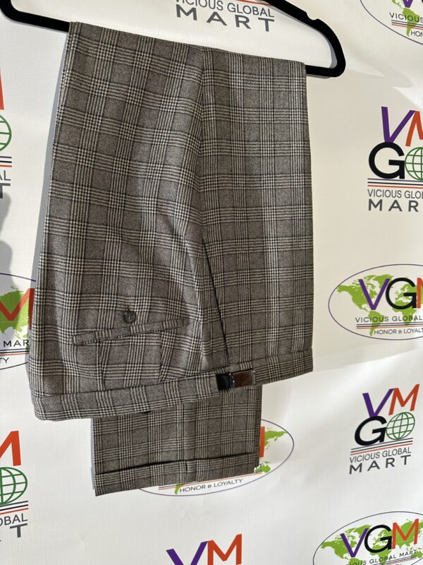 A pair of Gray Striped Dress Pants hanging on a hanger.