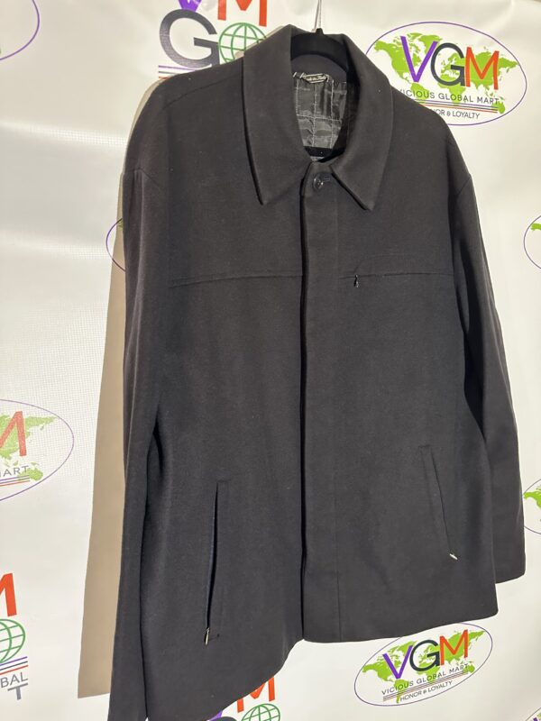 A Black Casual Jacket hanging on a hanger.